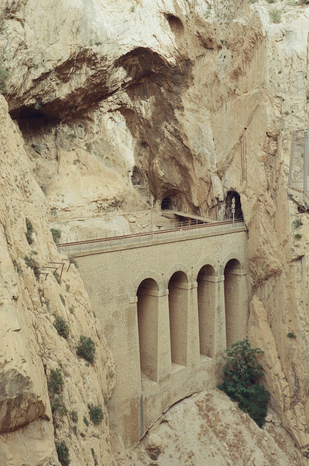 a bridge built into the side of a mountain