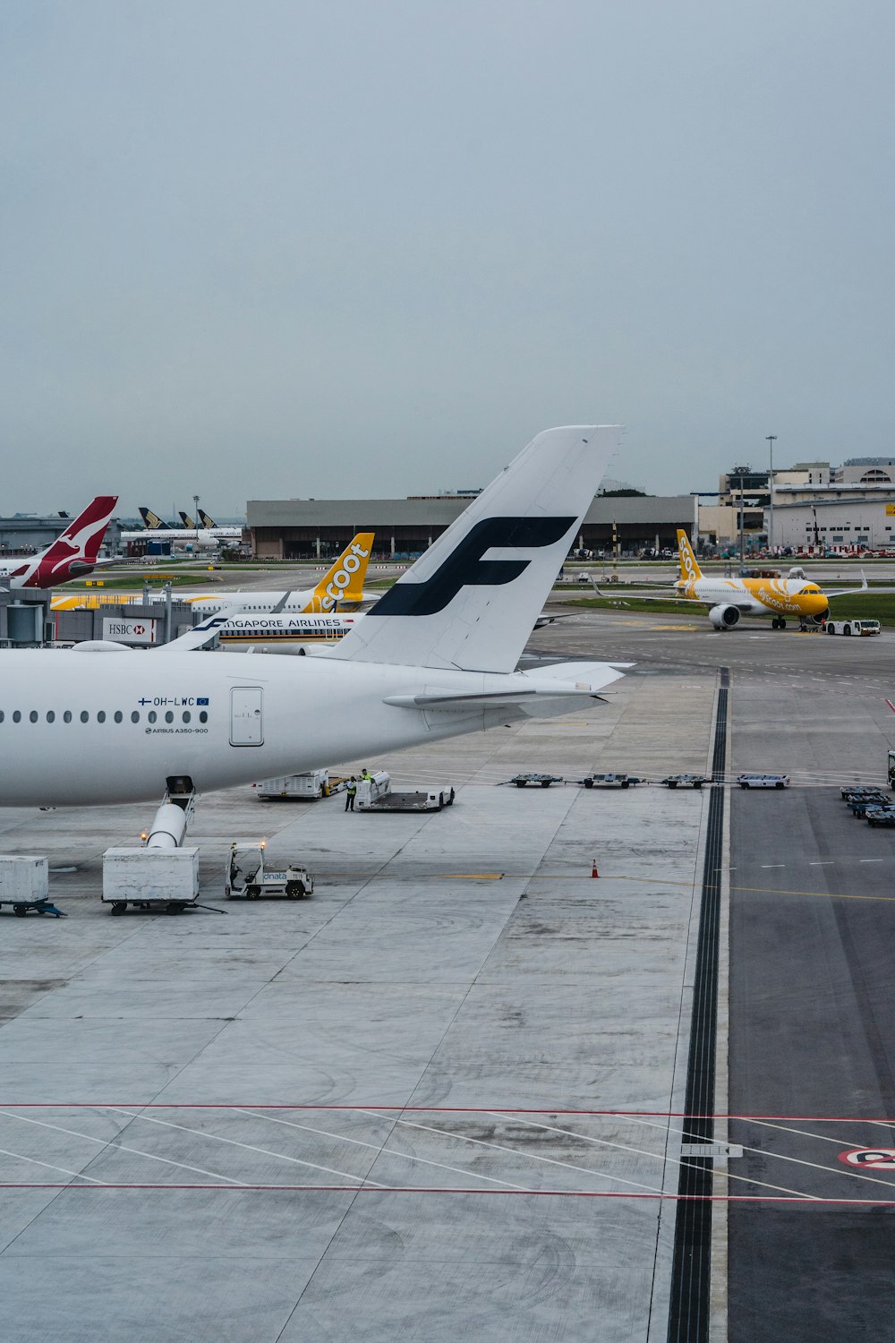 a large jetliner sitting on top of an airport tarmac