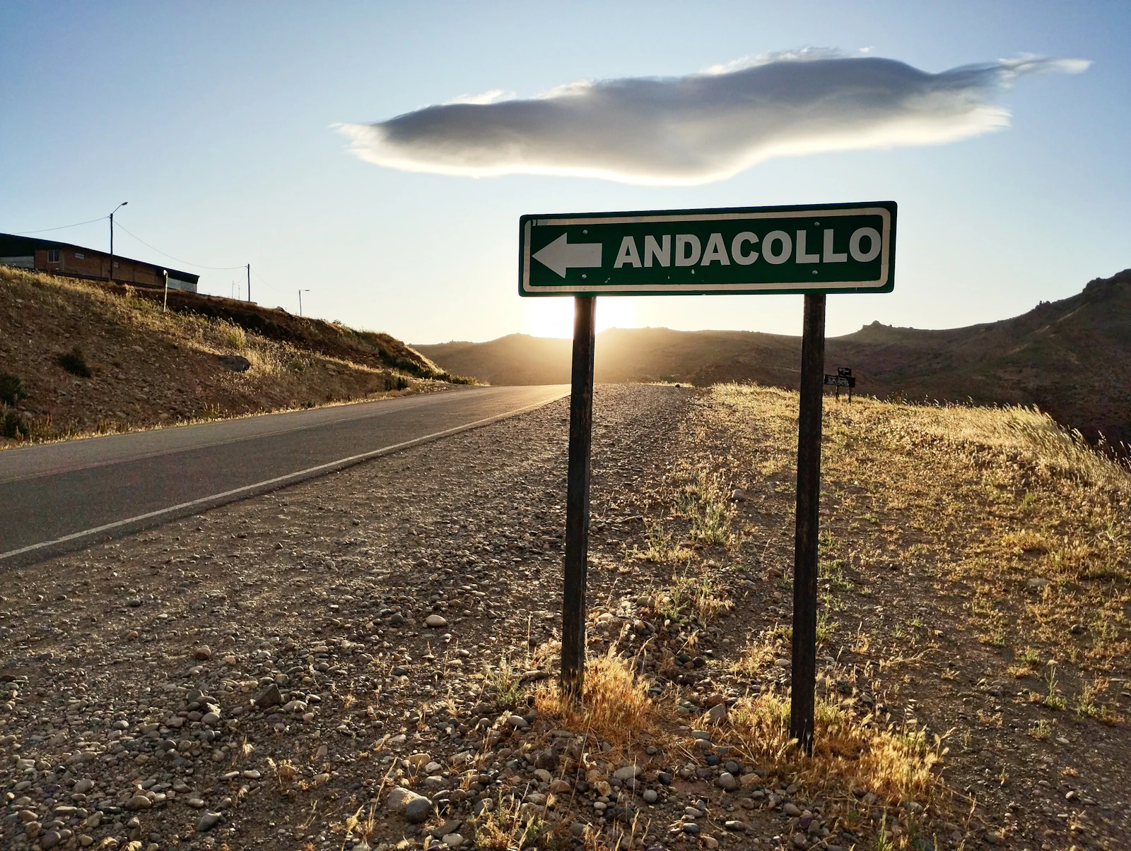 A road sign pointing toward Andacollo in Neuquén, Argentina
