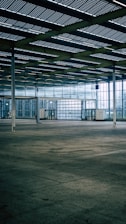 an empty parking garage with a lot of windows