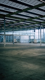 an empty parking garage with a lot of windows