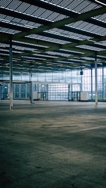 an empty parking garage with a lot of windows