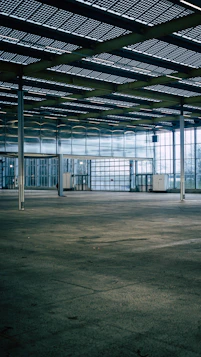 an empty parking garage with a lot of windows