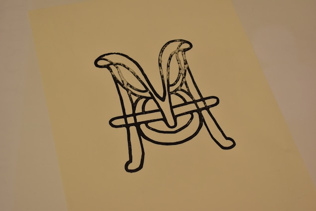 An abstract logo icon symbolizing harmony and wellness.