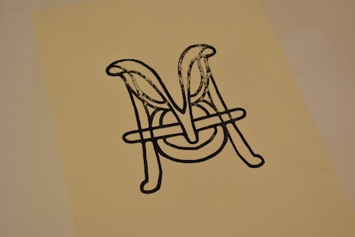 Abstract golden lines on black background symbolizing growth and connection.