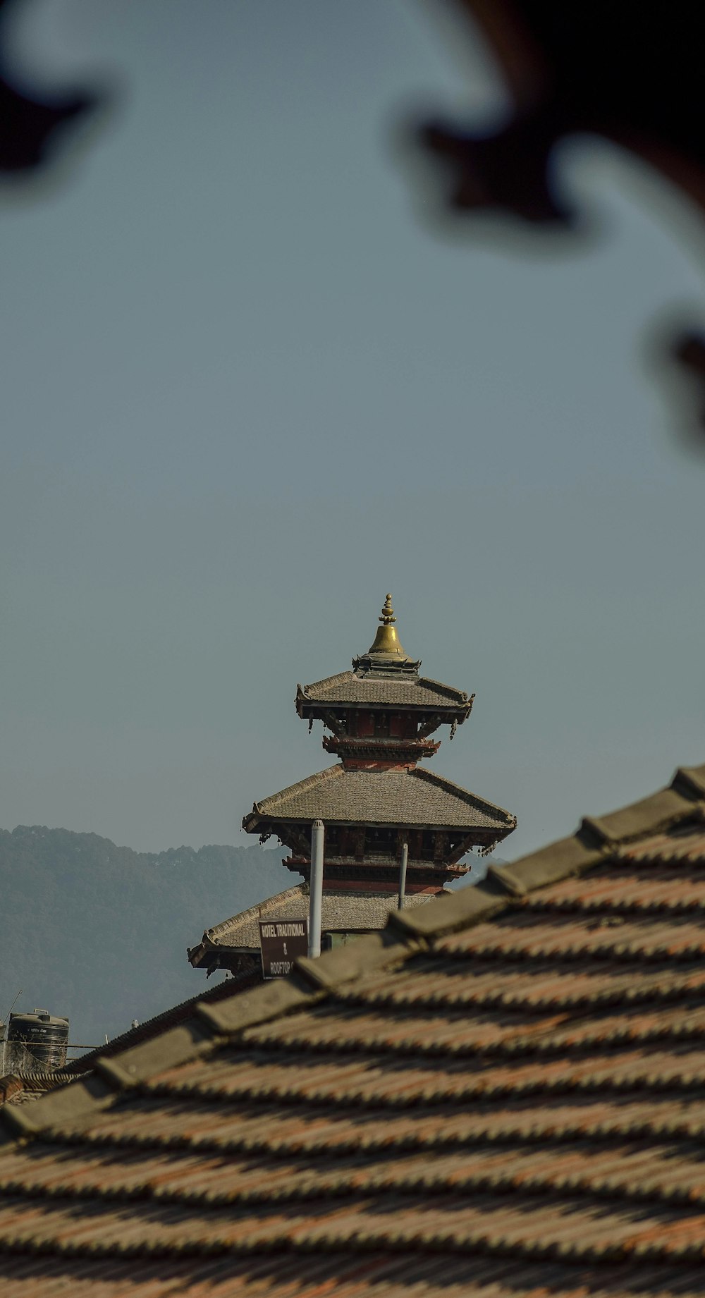 a tall building with a golden dome on top of it