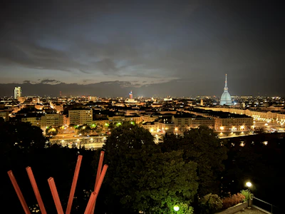 A nighttime shot of a city skyline powered by renewable energy sources.