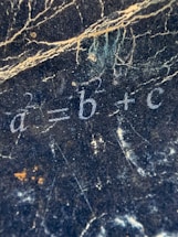 a close up of a marble surface with numbers on it