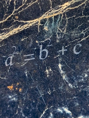 a close up of a marble surface with numbers on it