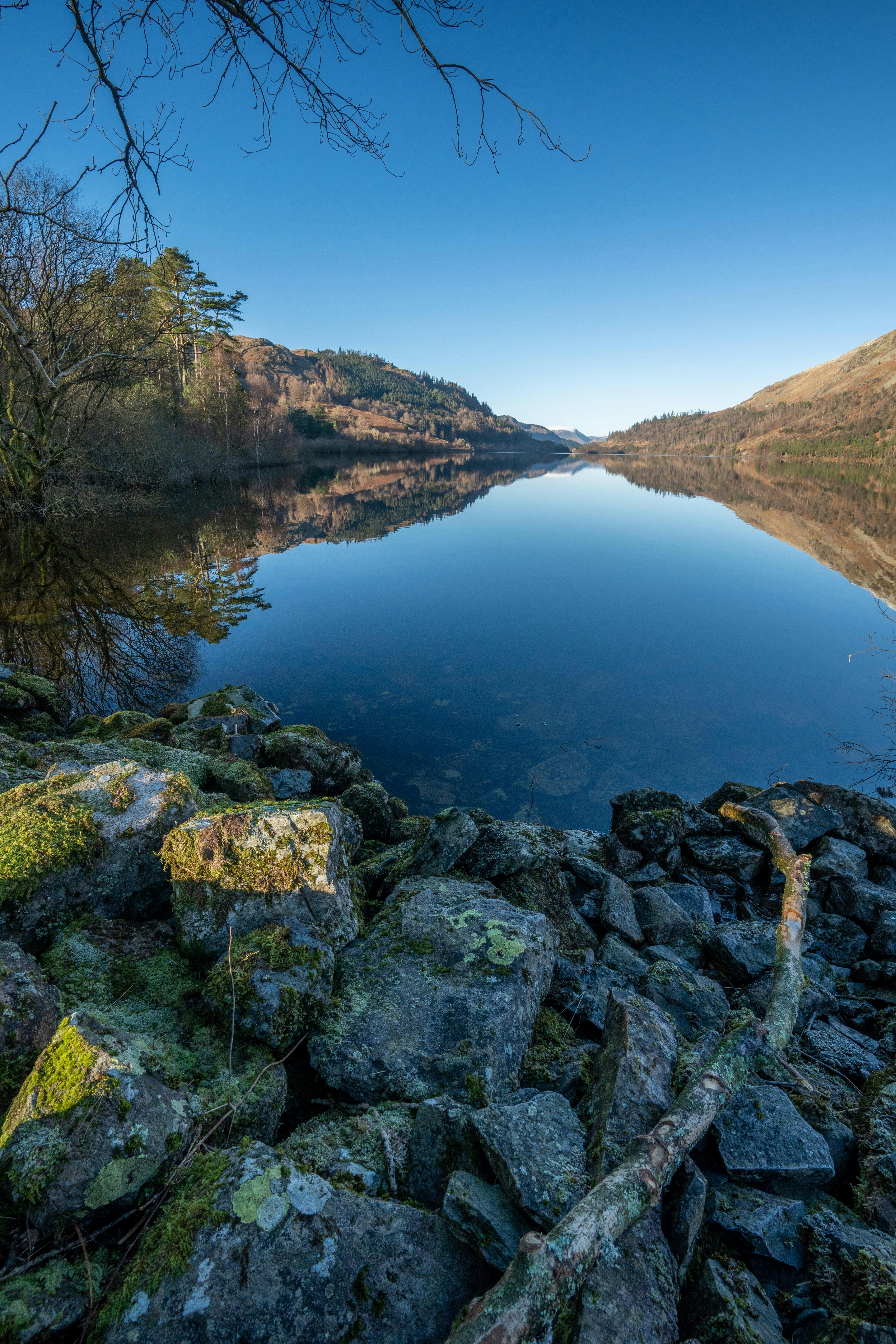 a large body of water surrounded by rocks