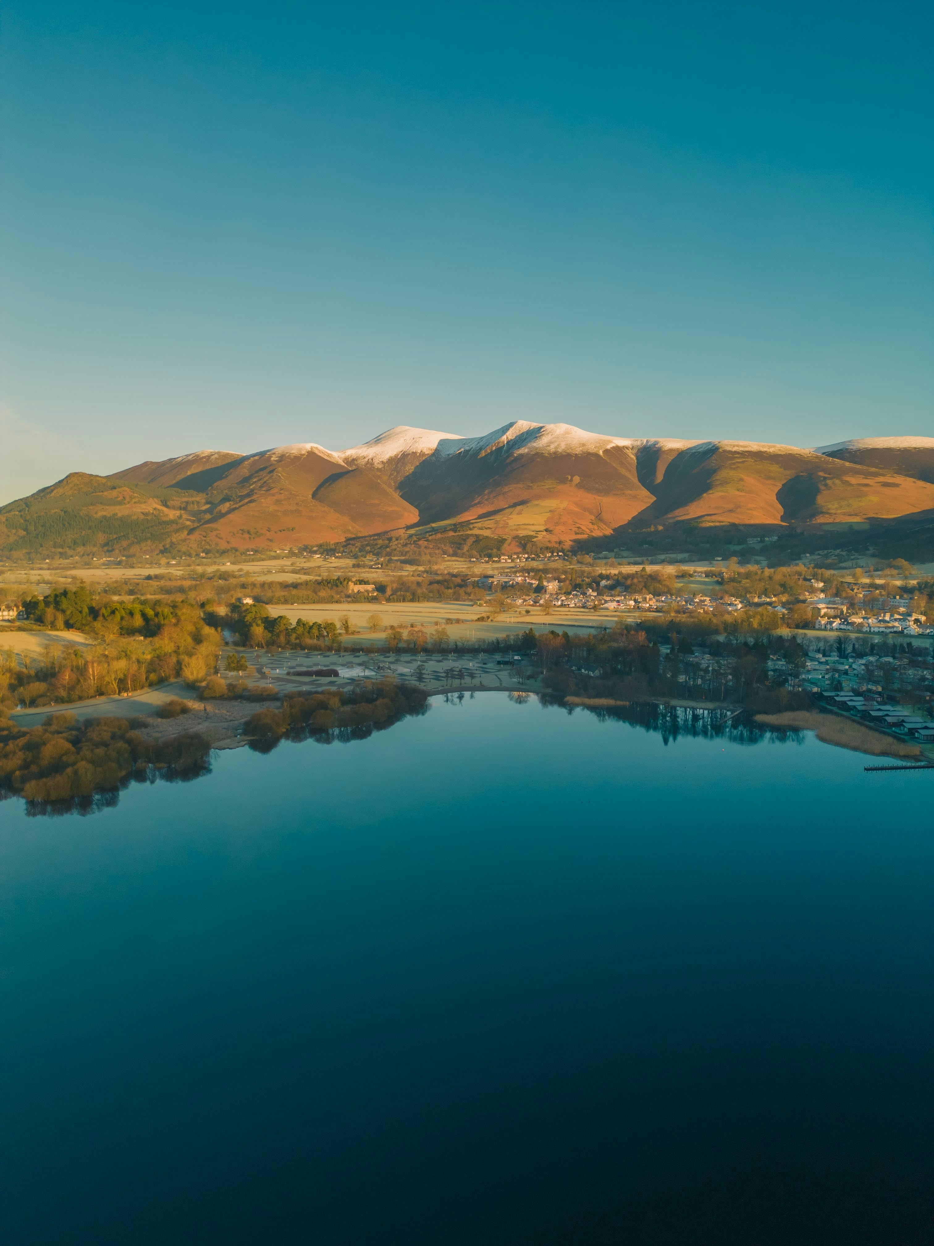 a large body of water surrounded by mountains