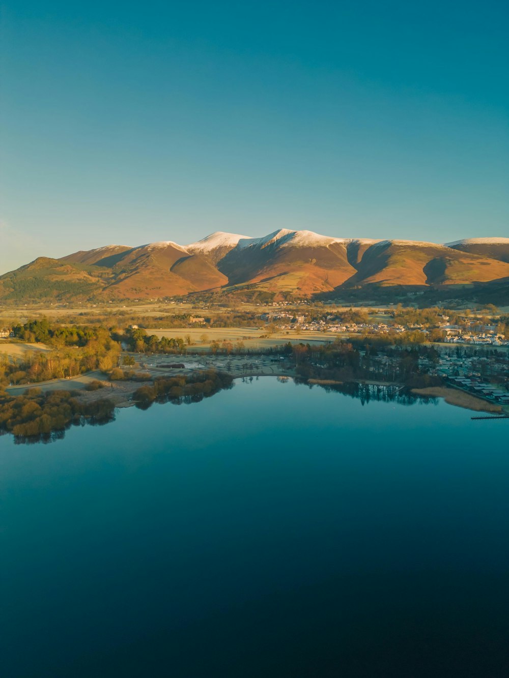 a large body of water surrounded by mountains