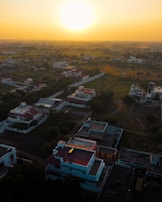 Aerial view of a newly developed residential neighborhood at sunset.