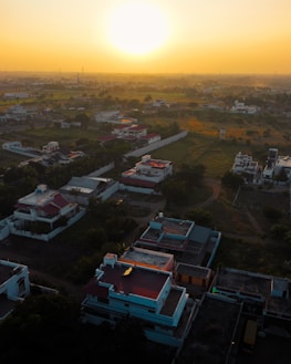 Aerial photo of a modern real estate property captured at sunset.