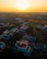 Aerial view of a luxury home taken by drone at sunset.