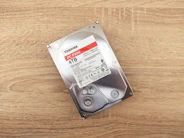 a hard drive sitting on top of a wooden table
