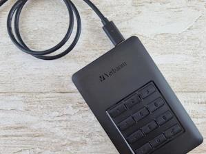 a close up of a cell phone on a table