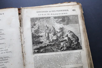 an old book with a picture of a man on it
