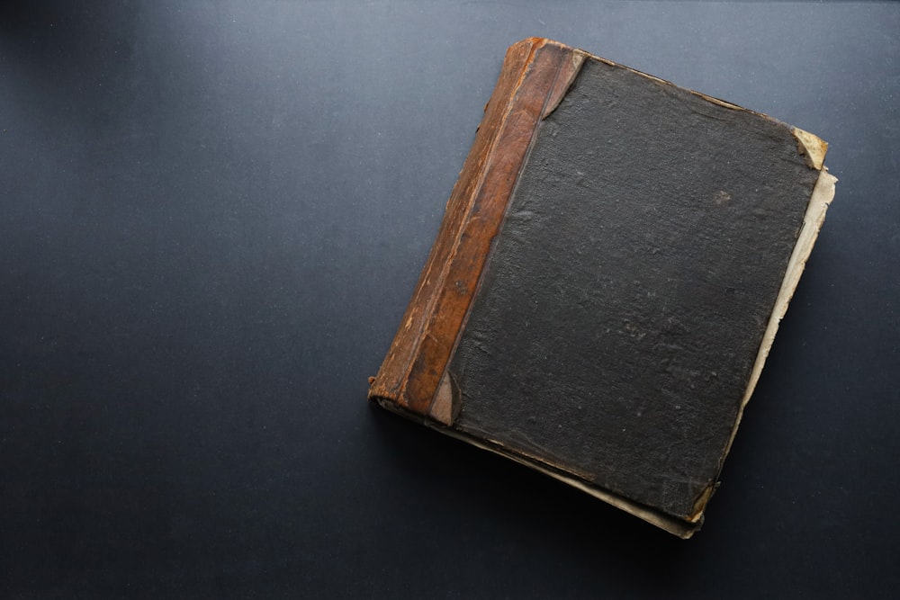 an old book sitting on top of a table