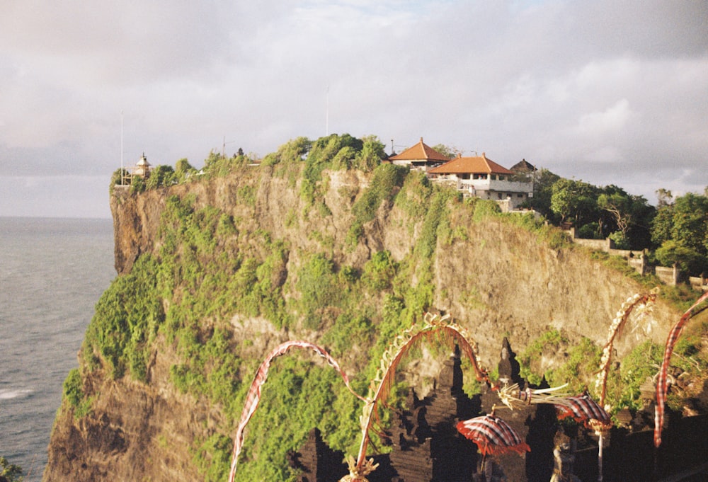 a view of a cliff with a building on top of it