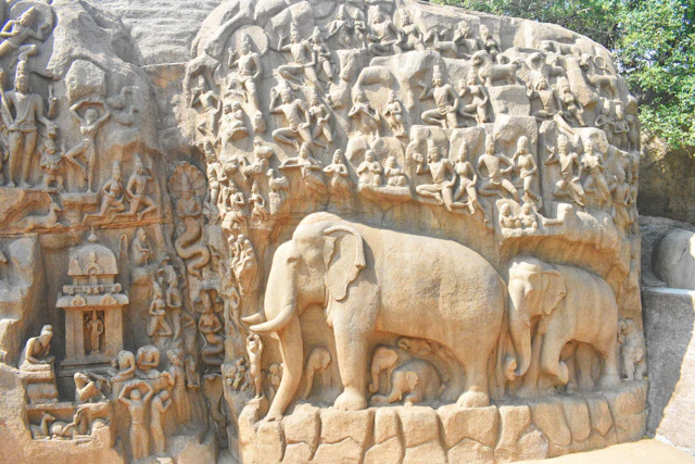 An elephant and other animals carved into a Pallava rock wall, Mahabalipuram