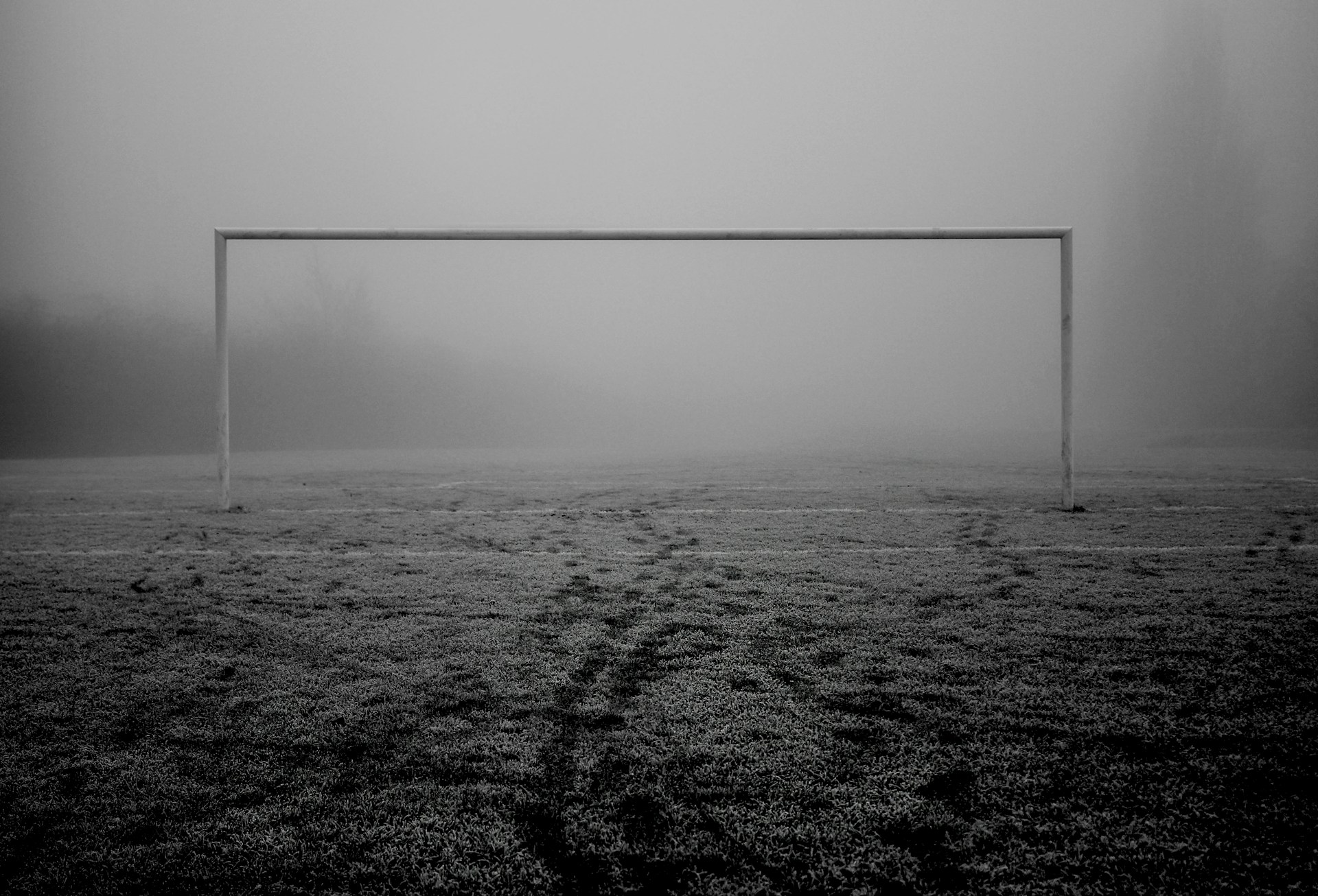 a soccer goal in the middle of a field