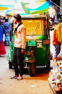 A happy family stepping out of a Chamoli Taxi Service car near a vibrant local market