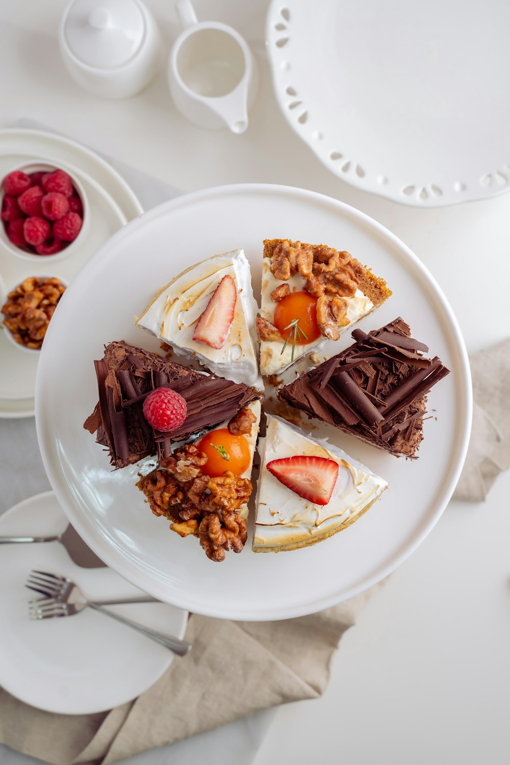 a white plate topped with slices of cake