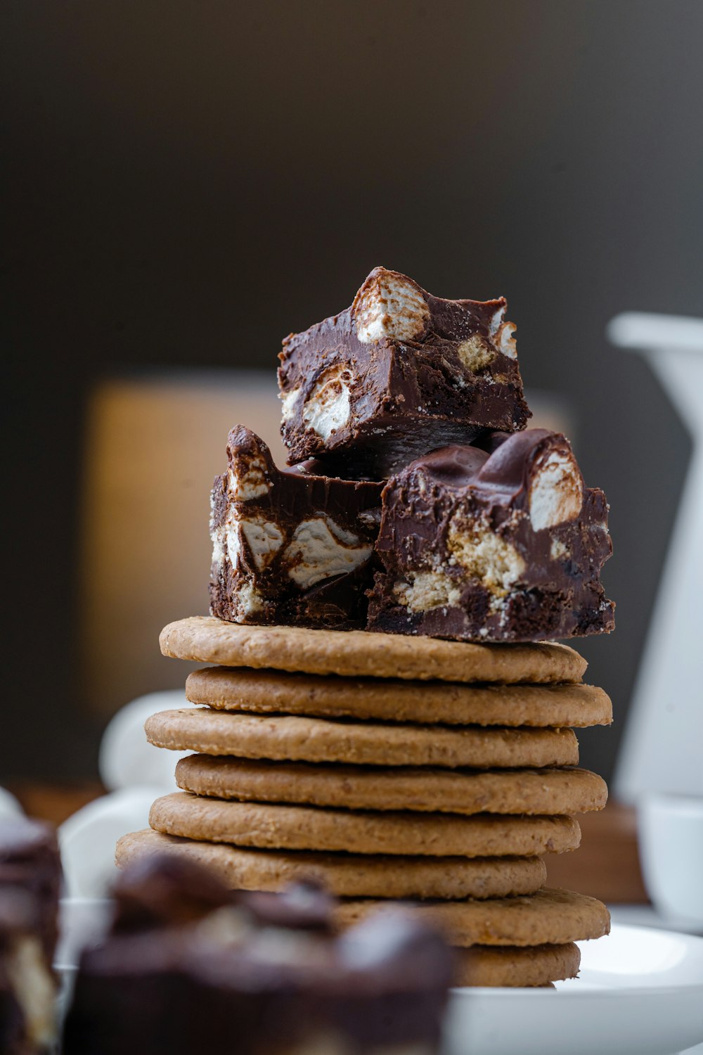 a stack of cookies sitting on top of a white plate