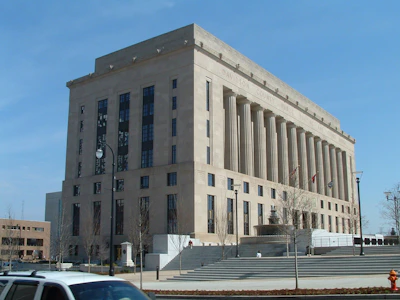 a large building with a clock on the front of it