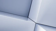 Close-up of intersecting geometric shadows on a matte black surface.