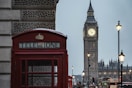 the big ben clock tower towering over the city of london