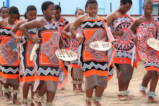 Girls participating in cultural activities and traditional dance.