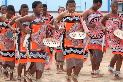 Girls participating in cultural activities and traditional dance.