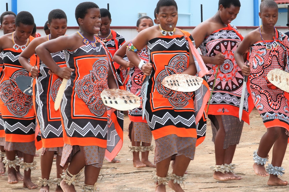 a group of young women in african dress