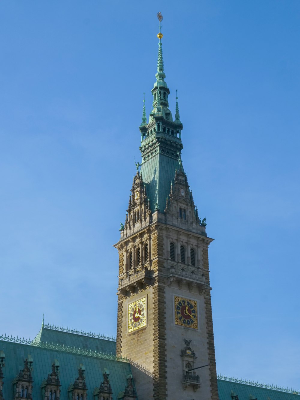 a tall clock tower with a sky background