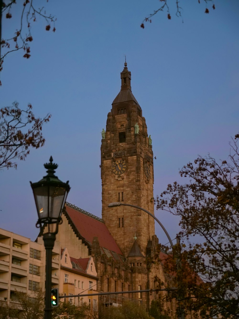 a tall clock tower towering over a city