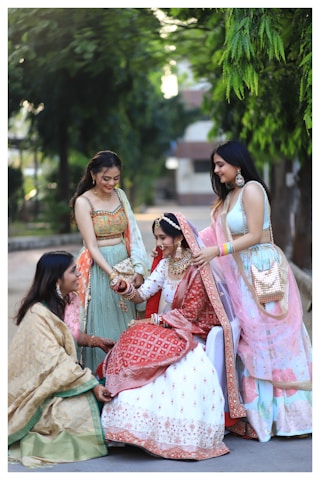 a group of women standing next to each other