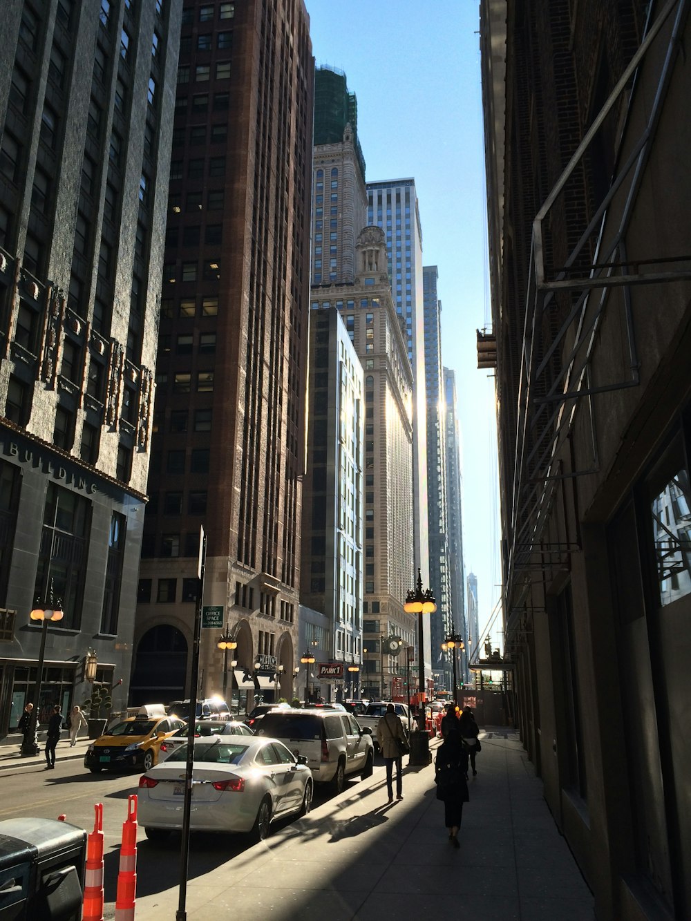 a city street filled with lots of tall buildings