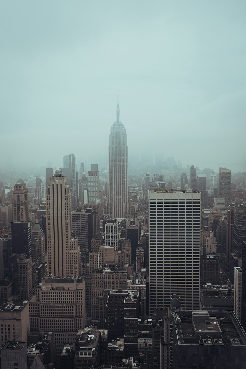 a view of a city from the top of a building