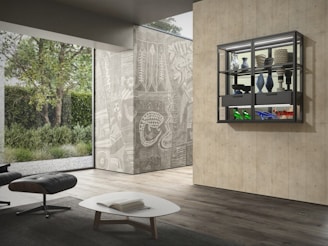 A stylish lounge area designed by Weaver Int featuring minimalist furniture and textured walls.