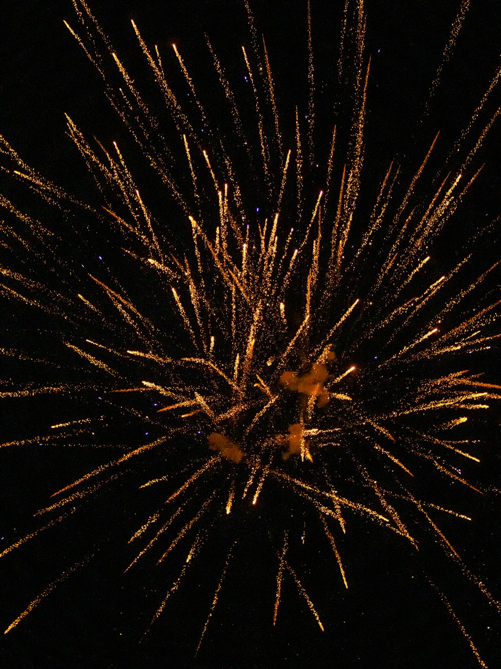 a bunch of fireworks are lit up in the night sky