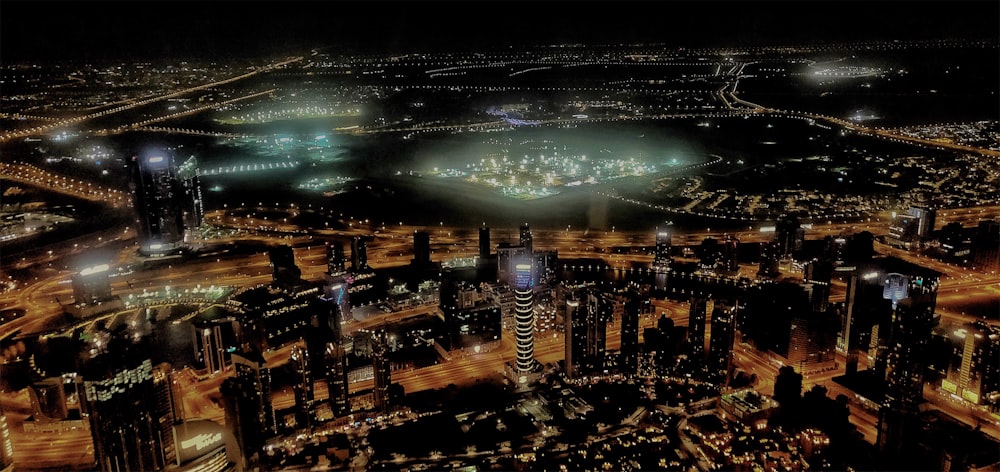 an aerial view of a city at night