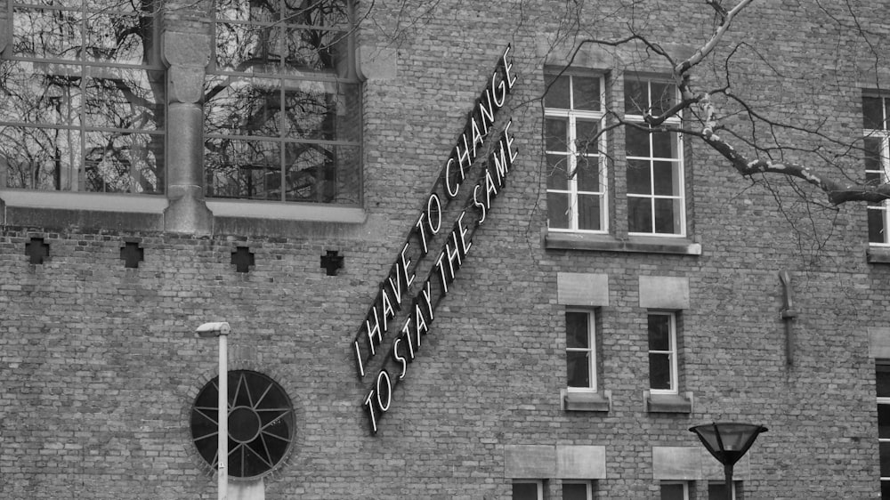 a black and white photo of a brick building