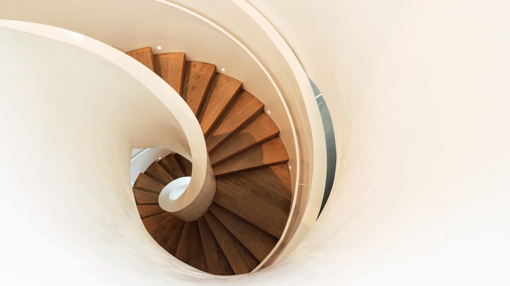 a view of a spiral staircase from the top