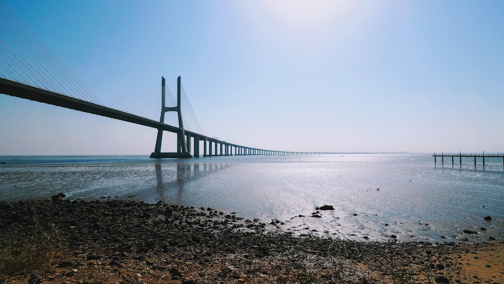 a large bridge spanning over a large body of water