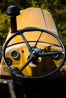 Dashboard of a classic tractor showcasing clear gauges and controls