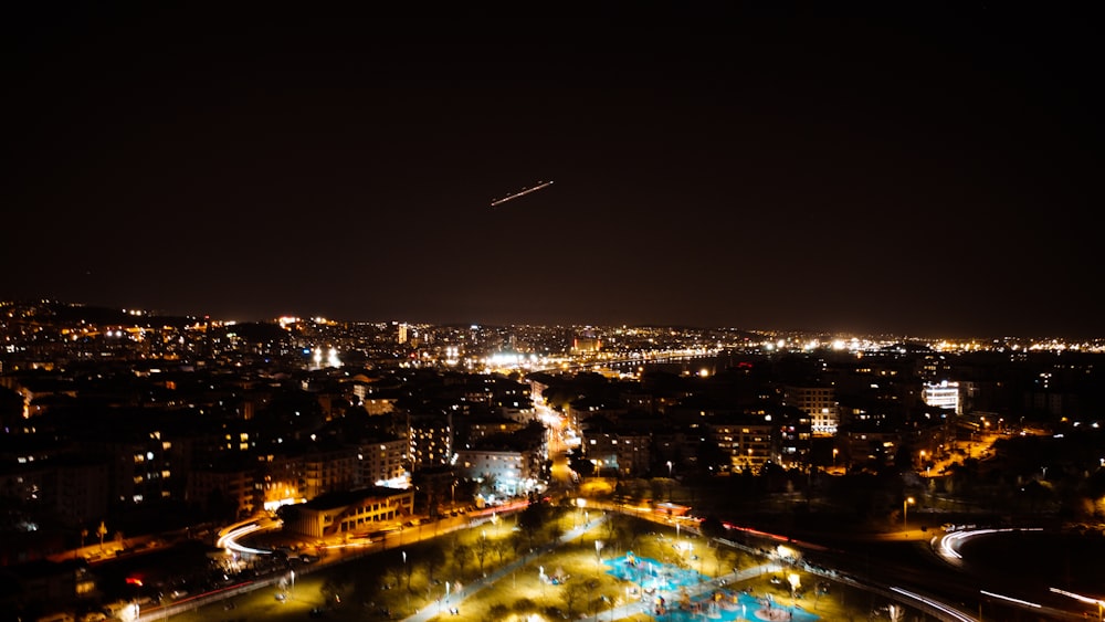 an aerial view of a city at night