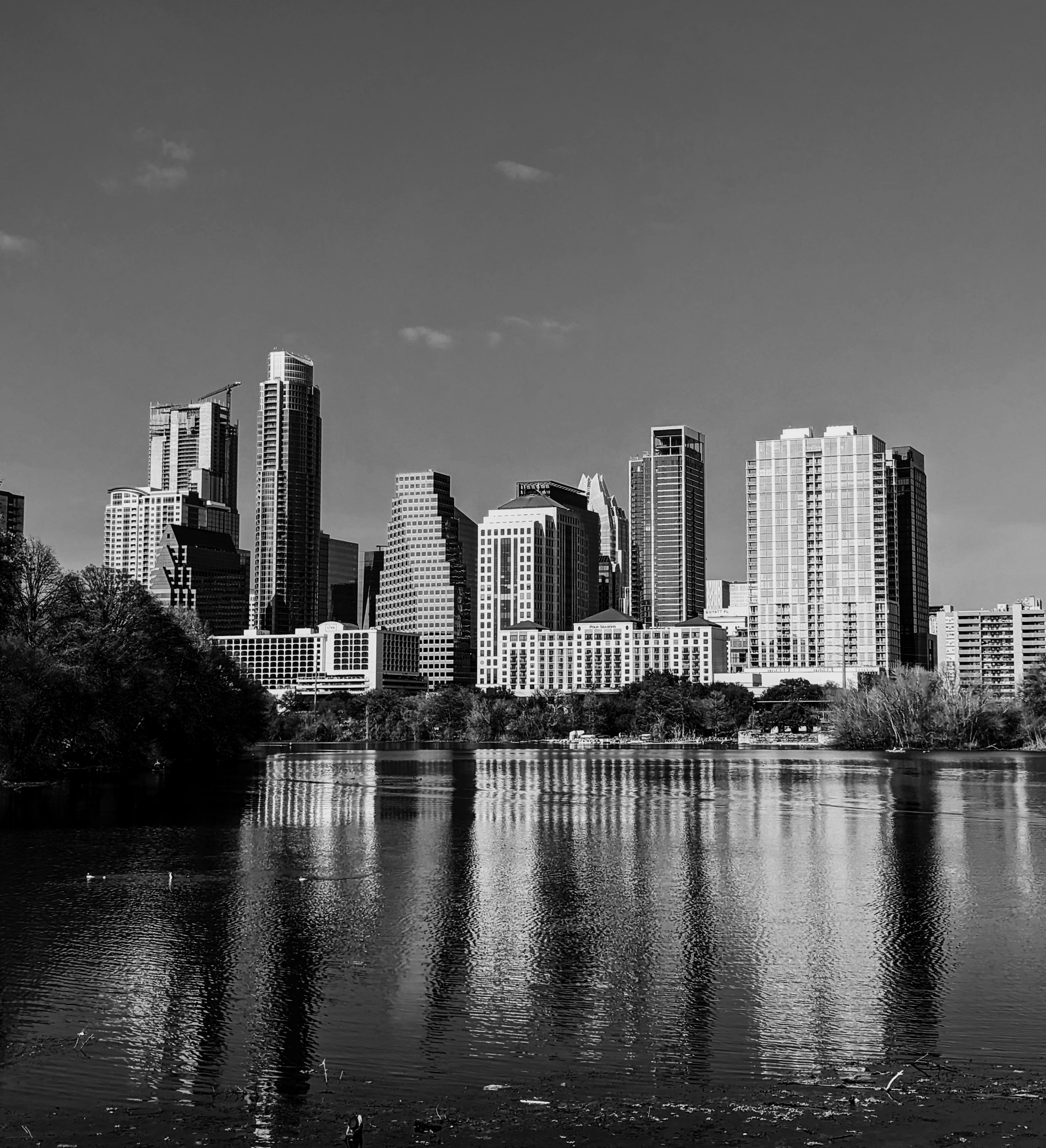 a black and white photo of a city skyline