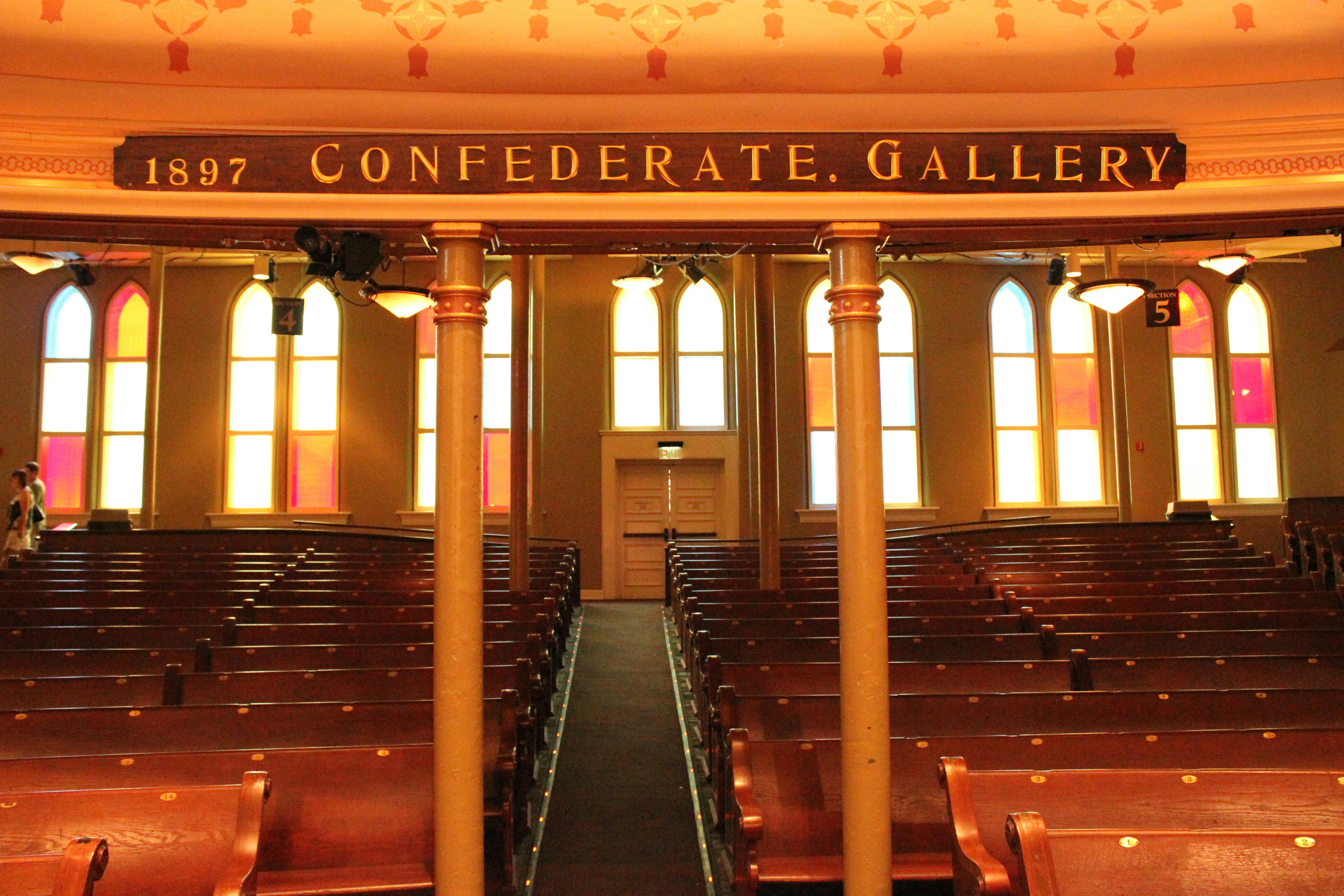 Music highway: Nashville to New Orleans – a large room with rows of wooden chairs